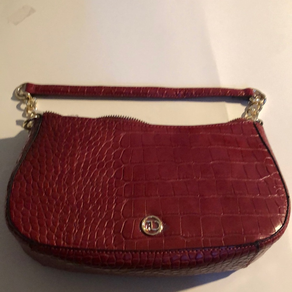 Red top zip baguette